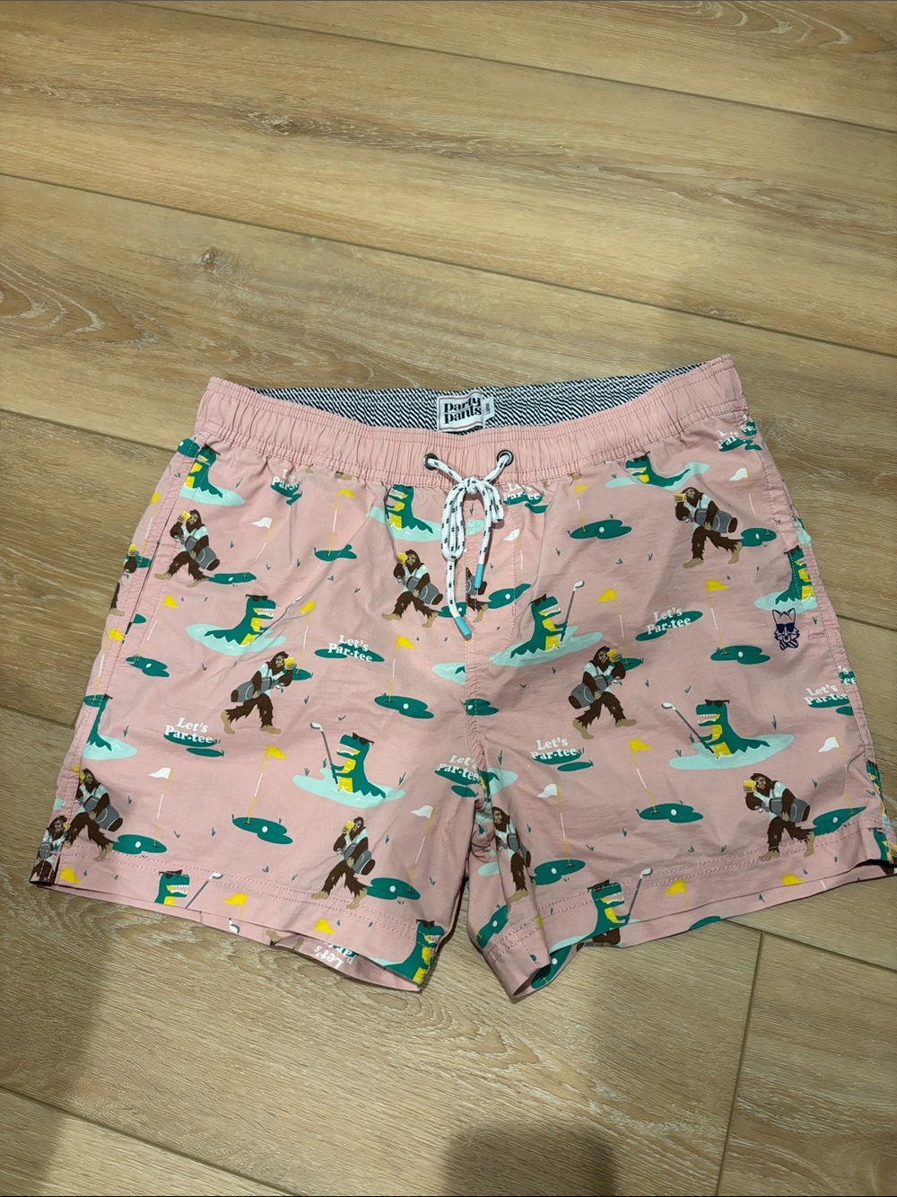 Pink Swim Shorts with Bigfoot, Golf, Dinosaur Print